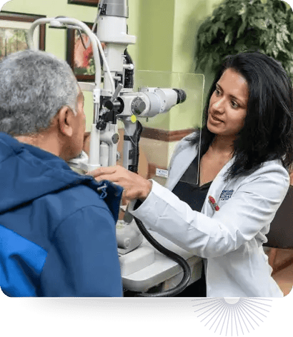 Eye care doctor consulting with a patient at Alden Leifer & Associates